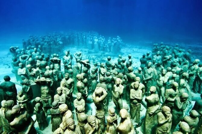 Snorkeling in Isla Mujeres and Underwater Museum - Guide service, equipment, and group comfort