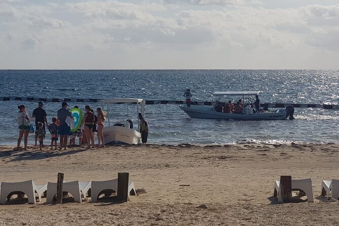 Snorkeling tour Express in Cancun with Certified Guide - Boarding the boat after hurricane damage