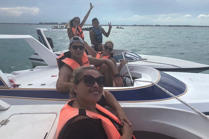 Speed Boat & Snorkel Tour with transportation ( only Cancun zone area) - Learning to drive your own boat