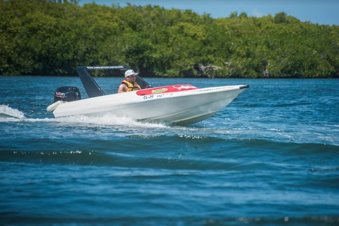 Speedboat and snorkel tour: Single Passenger Boat - Following the guide across the water