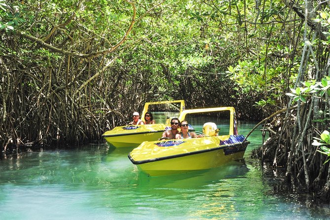 Speedboat jungle tour and snorkel - Driving a speedboat through Cancun’s lagoon