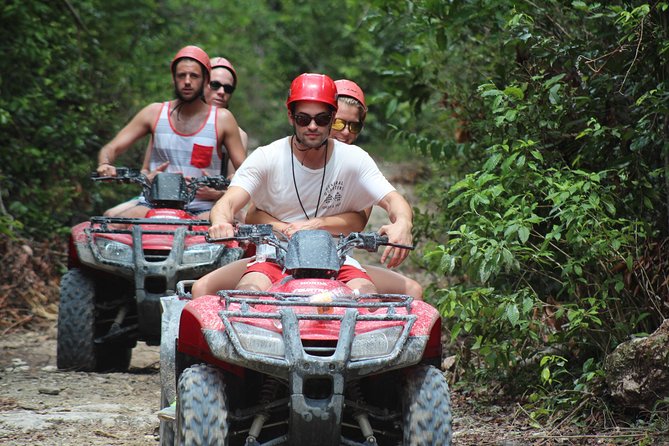 The best ATVs, zipline, cenote tour with lunch and transportation - Hotel pickup and the long road to the cenotes