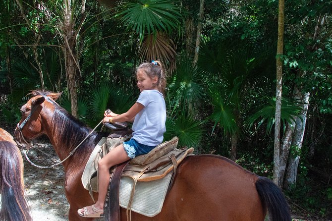 The best ATVs, zipline, cenote tour with lunch and transportation - Ziplines and horseback riding