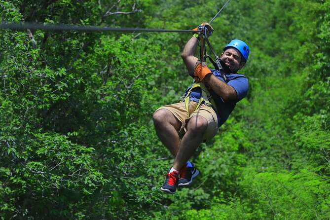 Top ATV's in Mexico includes Cenote, Ziplines, snack & transport. - Ziplines through the treetops