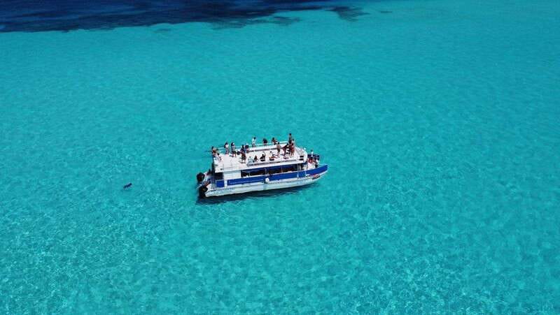 Tour Isla Mujeres: From Cancún-Riviera Maya all Included - Isla Mujeres center and North Beach