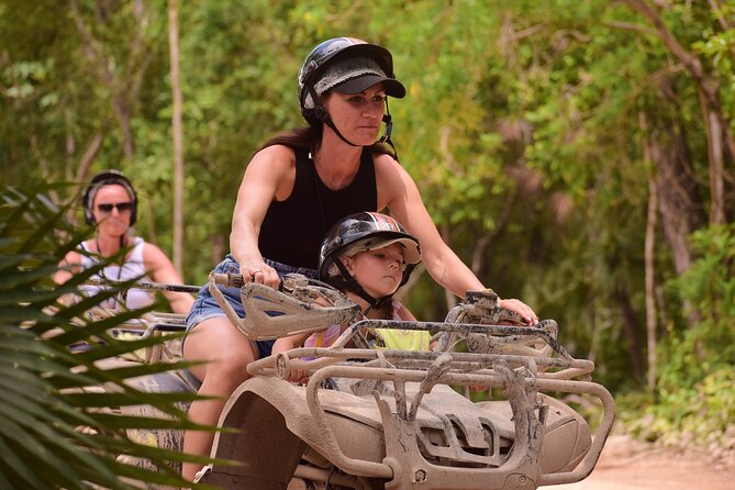 Tulum Adrenaline Tour ATV Ziplines and Cenote Swim Day - Swimming in an underground cenote