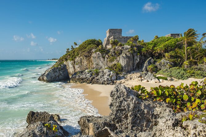 Tulum Ruins, Sea Turtles & Cenote Swim Adventure Tour - Tulum ruins above the Caribbean