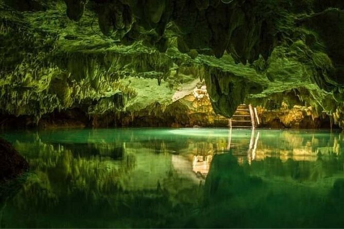 Tulum Ruins visit cenotes house turtle and Sculpture Come to Light - Ven a La Luz: a famous photo with a short window