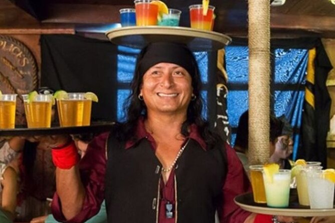 Unforgettable Pirate Dinner Adventure in the Mexican Caribbean - Boarding with cannon fire and crew-led games