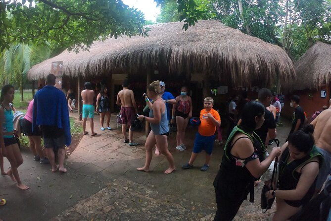 Visit Chichén Itzá and discover a real Cenote and Valladolid. Transport included - Entering Chichén Itzá with a guide