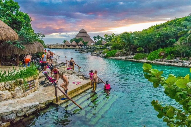 Xcaret Aquatic Theme Park Private 12 hrs Trip from Cancun by van - Swimming through caves and natural pools