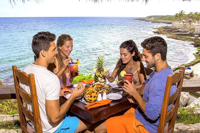 Xcaret Park Day Tour & Night Show with Transportation - Swimming through the underground rivers
