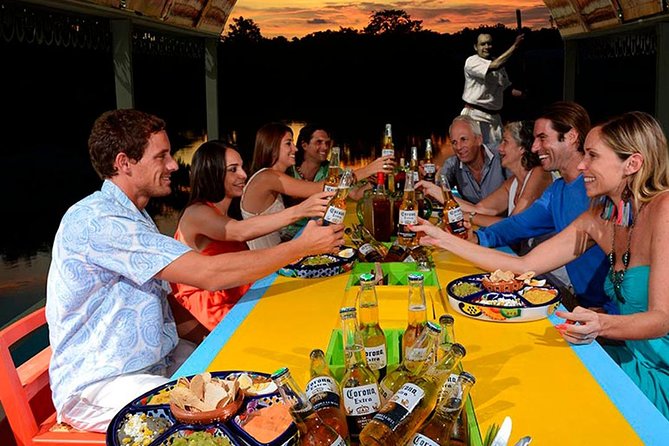 Xoximilco Mexican Tour With Transportation Included - The trajinera ride through the Cancun canals