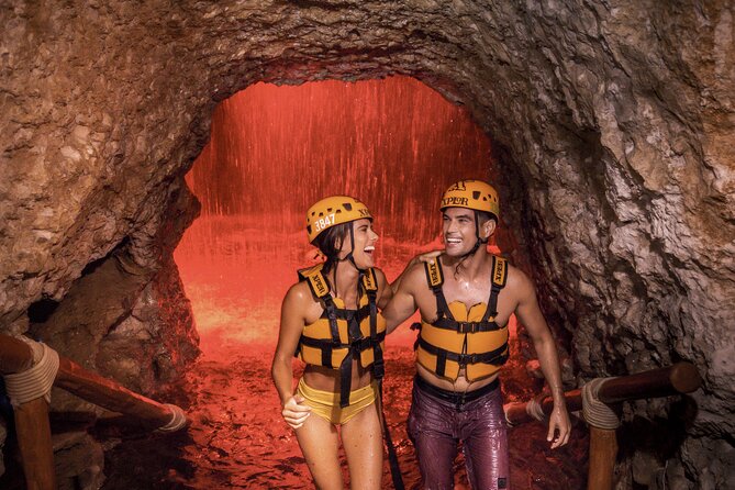 Xplor Fuego with Buffet Style Dinner and transportation - Cave rafting, underground swimming, and the hammock splash